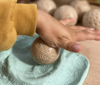 Yellow Door Roll Around – Nature Stone Balls | | Yellow Door | Little Acorn to Mighty Oaks