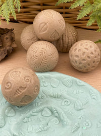 Yellow Door Roll Around – Nature Stone Balls | | Yellow Door | Little Acorn to Mighty Oaks