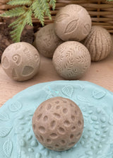 Yellow Door Roll Around – Nature Stone Balls | | Yellow Door | Little Acorn to Mighty Oaks