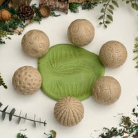 Yellow Door Roll Around – Nature Stone Balls | | Yellow Door | Little Acorn to Mighty Oaks